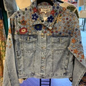 NWT Original denim jacket with embroidered flowers.